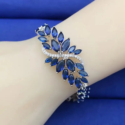 Copper bracelet with gold electroplating and micro-inlaid zircon stones in ice flower design