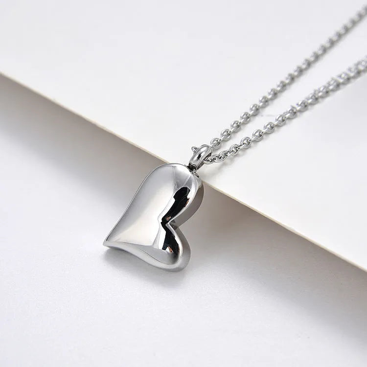 Silver curved 23mm peach heart pendant stainless steel necklace with 51cm + 5cm adjustable chain