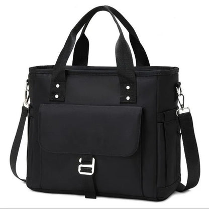 A pink cube-style Oxford cloth belt bag with a removable shoulder strap and a side pocket.