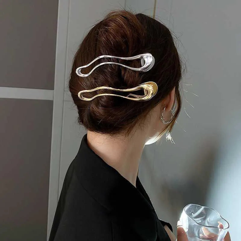 Women's zinc alloy hair barrettes in gold and silver with square, arc, and triangle shapes