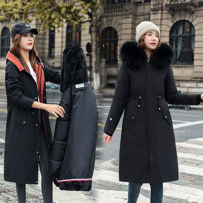 Women's long padded beige trench coat with a fleece lining, shown on a model.