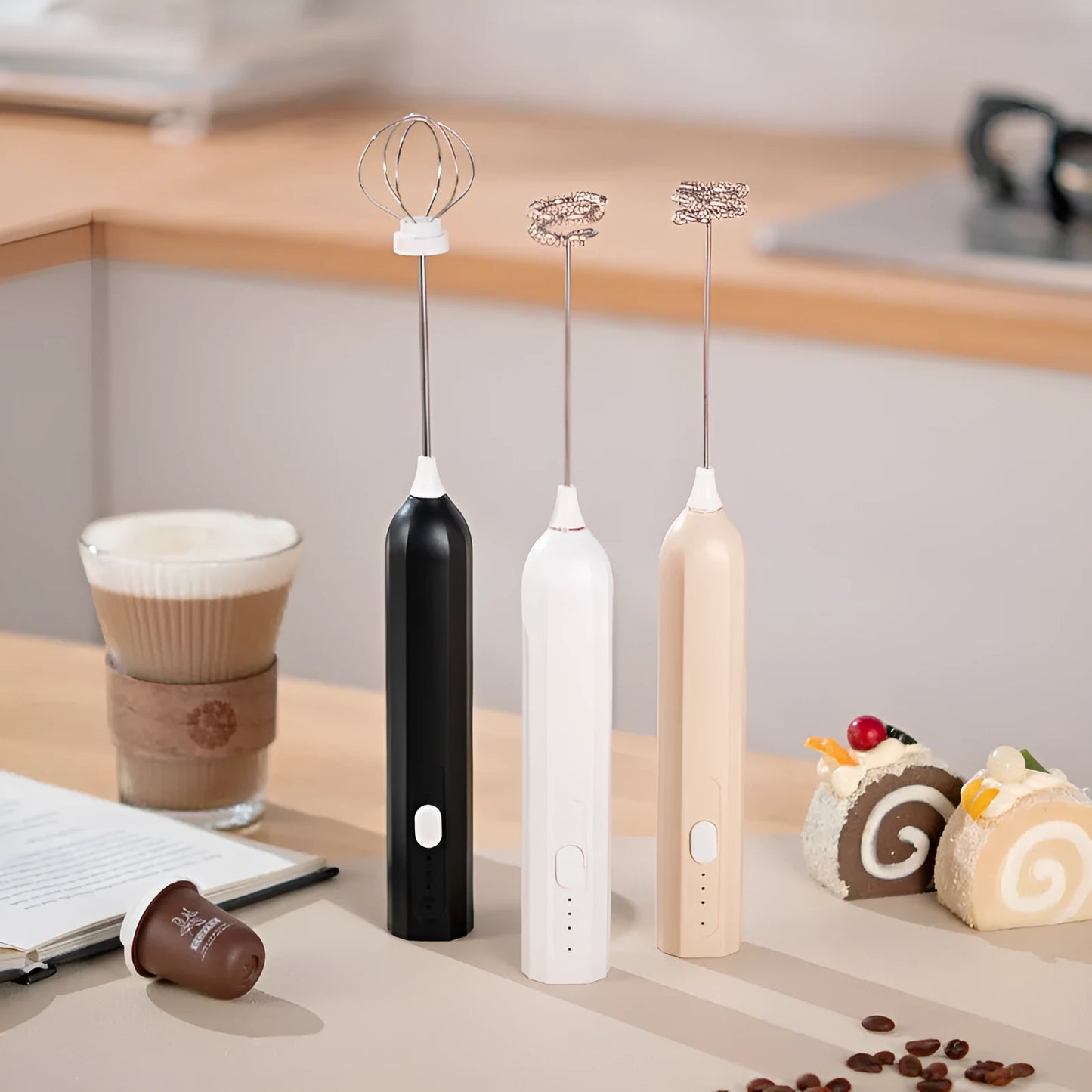 Handheld USB rechargeable electric whisk in apricot colour with mixing attachment