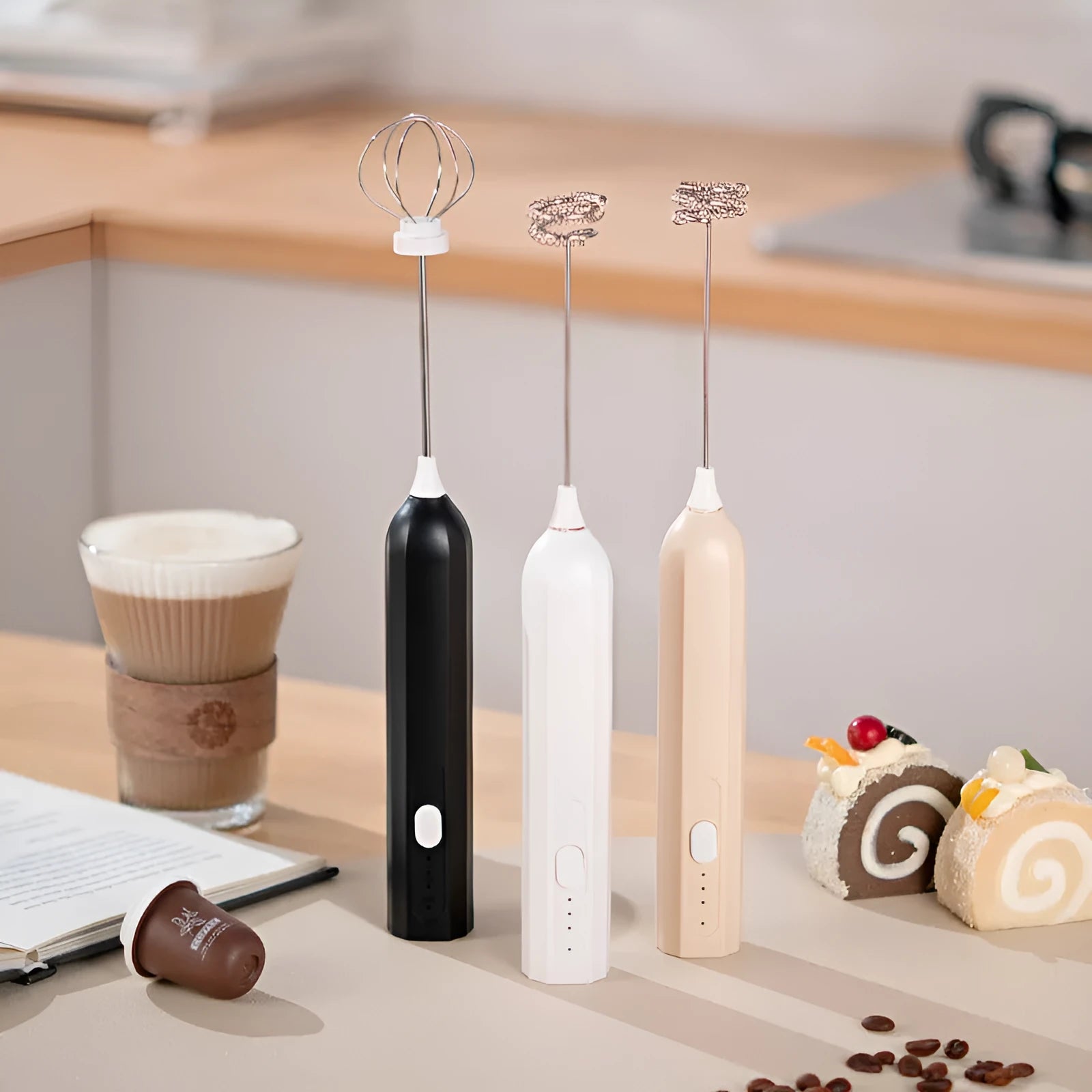 Handheld USB rechargeable electric whisk in apricot colour with mixing attachment