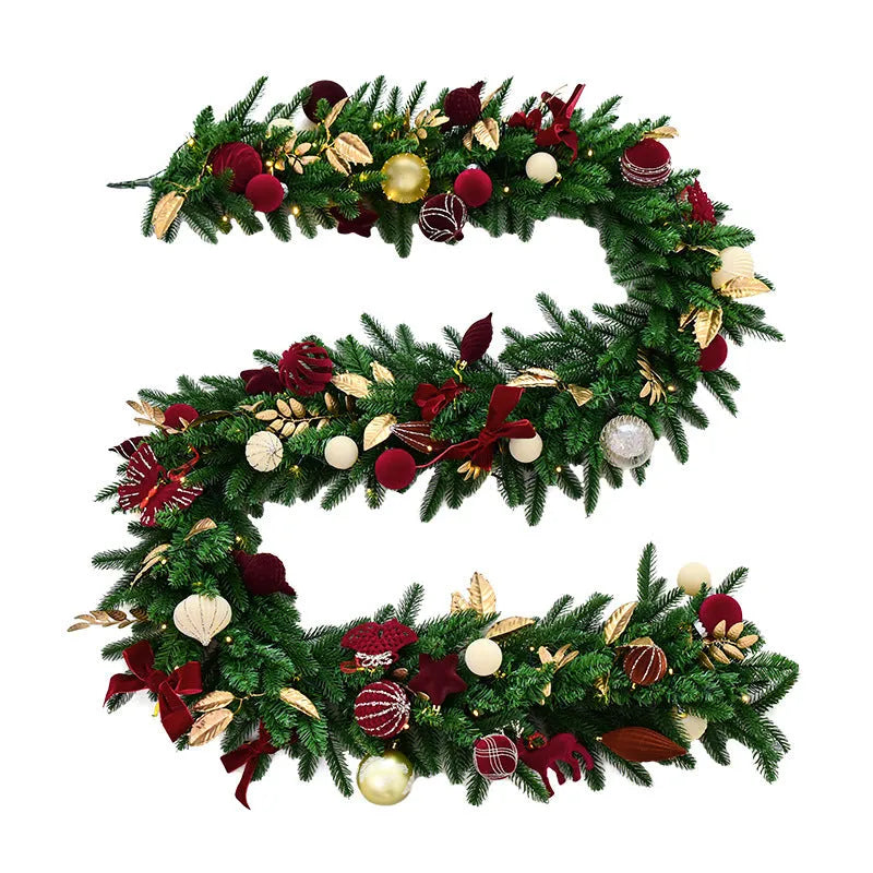 Long 2.7 metre Christmas PE rattan garland with velvet balls and integrated lights in golden leaf or red rattan colour.