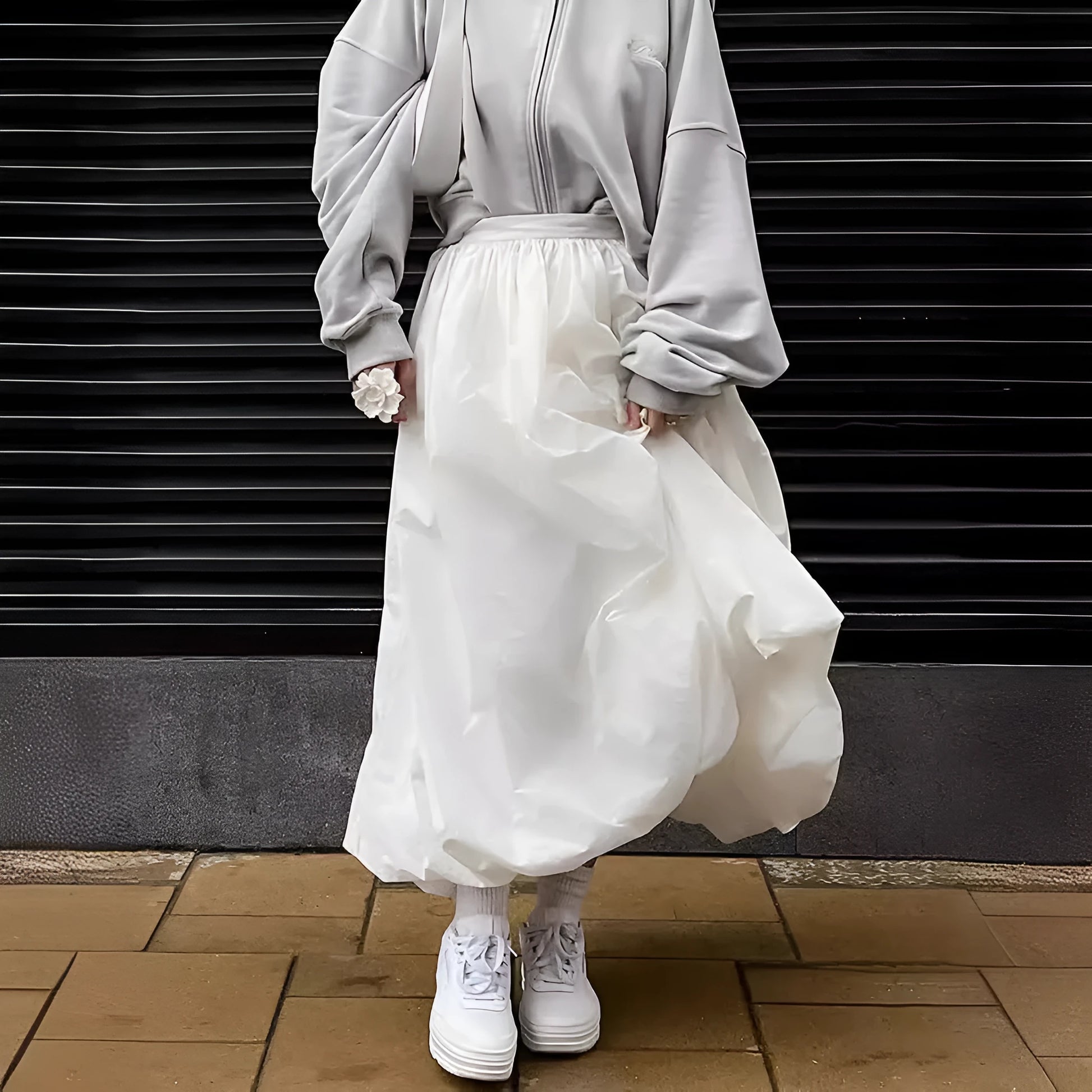 Women's long solid-colour cotton skirt shown in black and white.