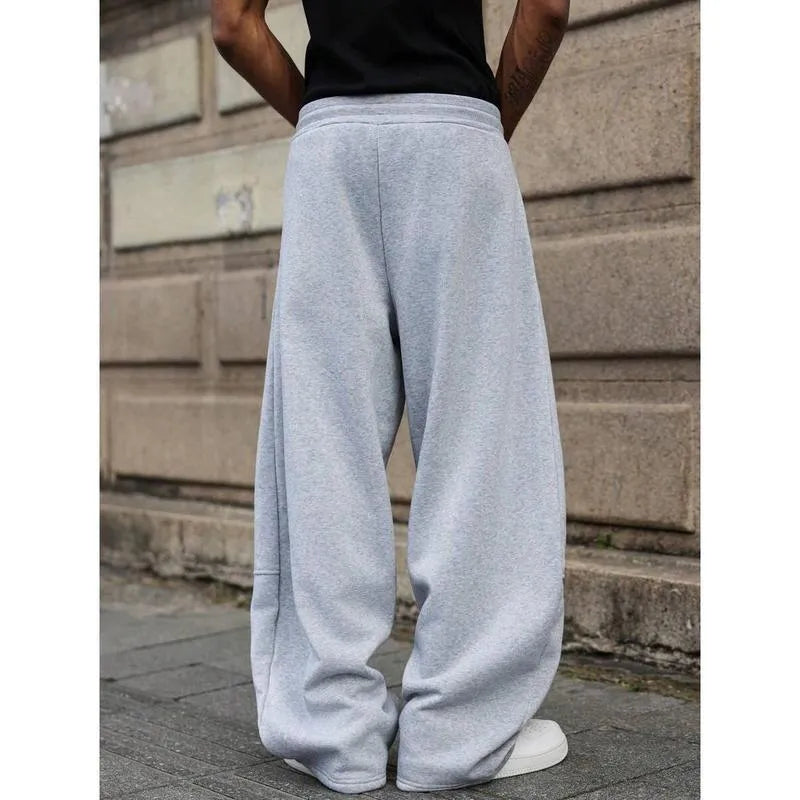 Men's straight-leg casual trousers in bamboo fibre fabric with high waist, cropped length, and high elasticity available in dark grey, light grey, khaki, and black colours