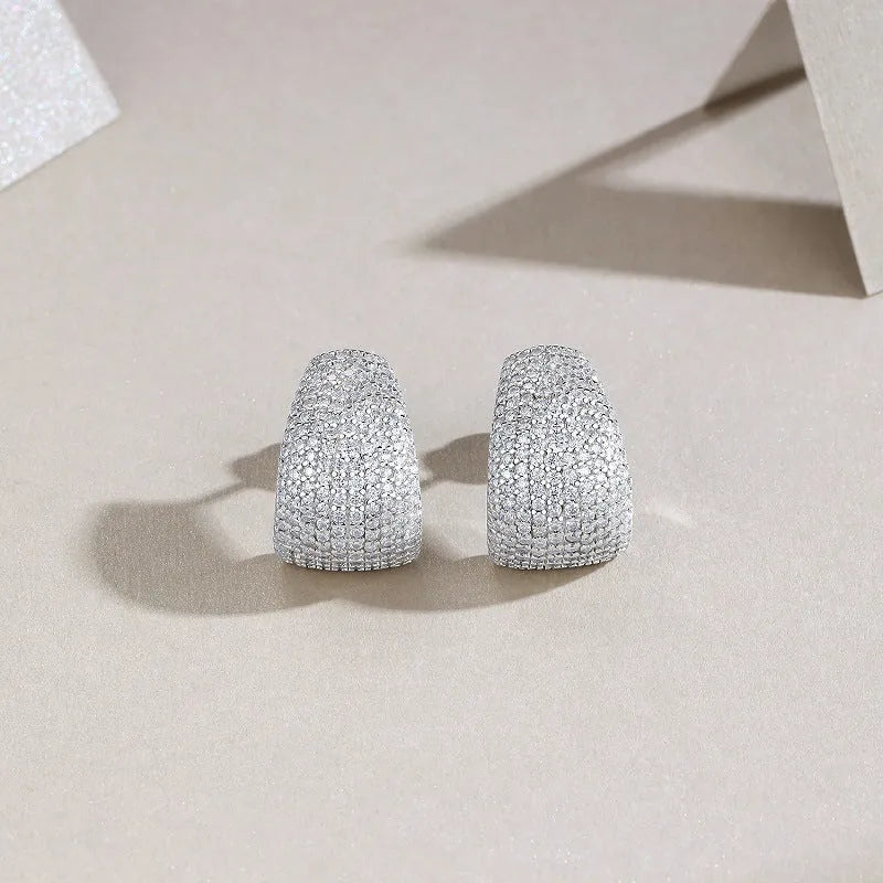 Geometric sterling silver ear studs with moissanite stones in gift box
