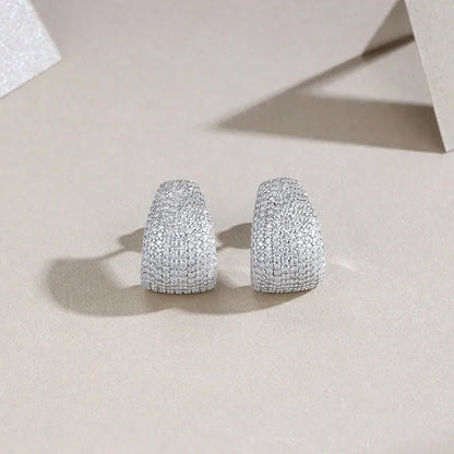 Geometric sterling silver ear studs with moissanite stones in gift box