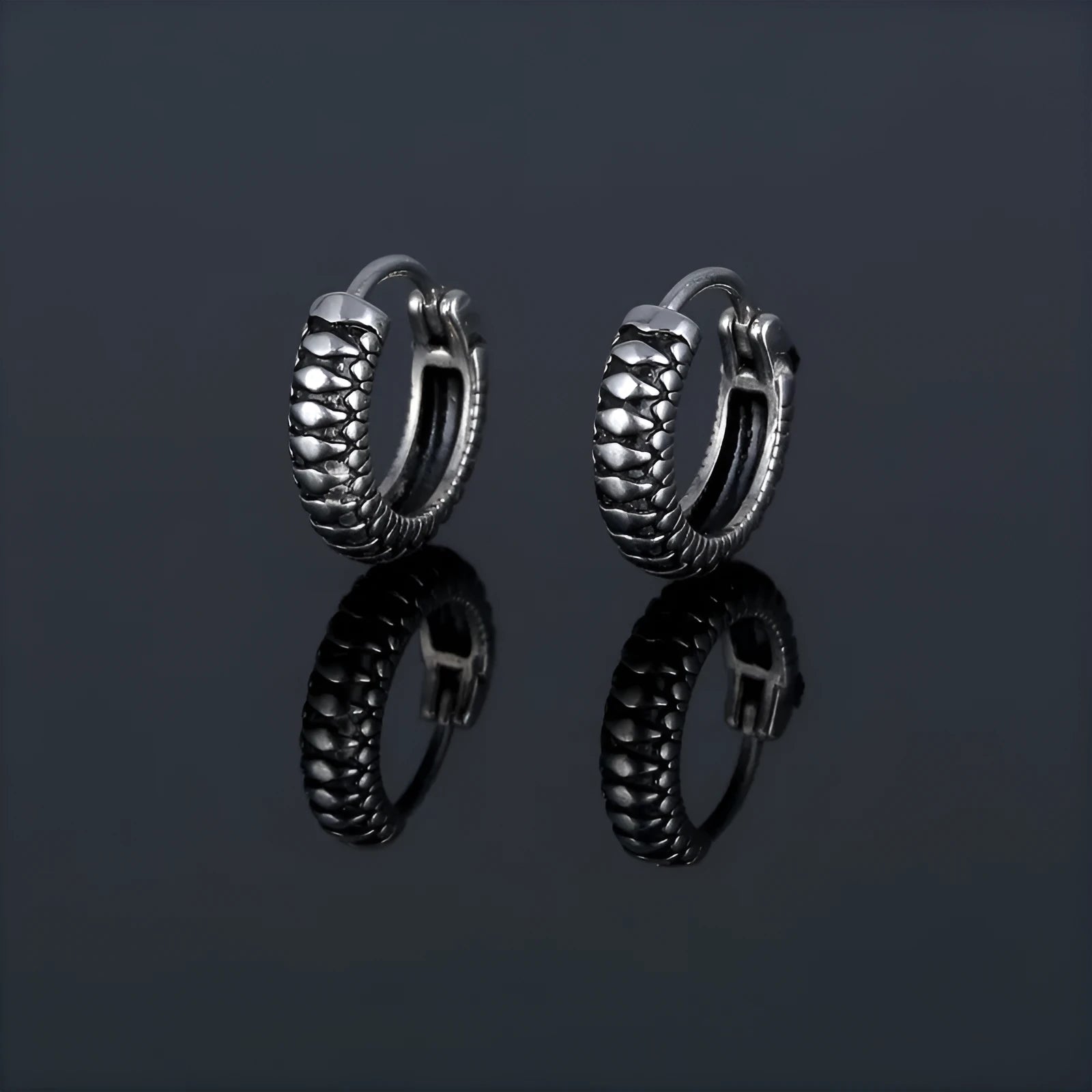Silver retro twist earrings with geometric stripe design and round elements on stainless steel
