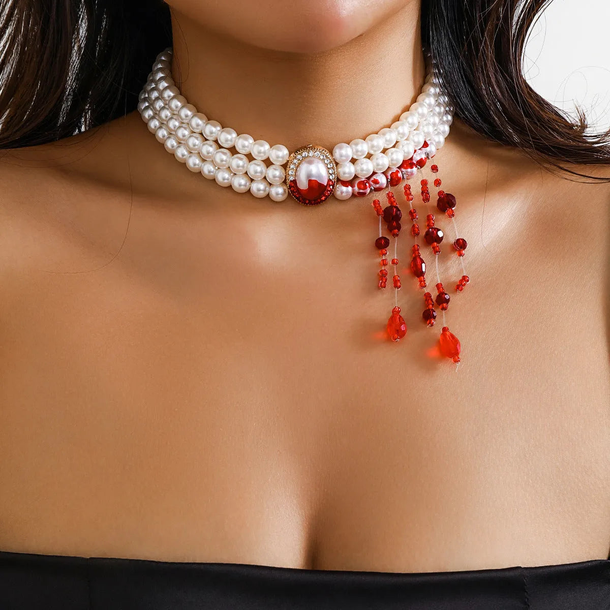 Halloween jewellery set with pearl collar design in gothic retro style showing necklace, bracelet and earrings