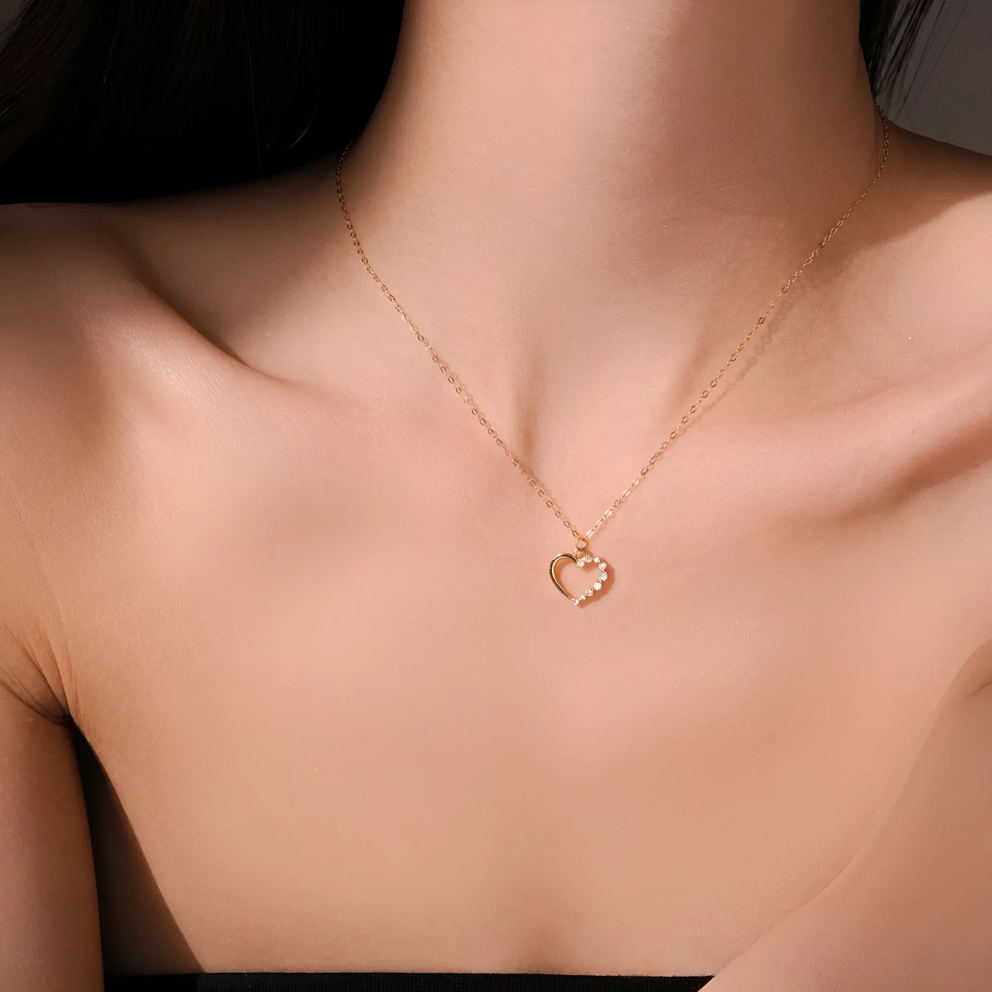 S925 sterling silver hollow heart necklace on a regular chain, available in gold or platinum plating.
