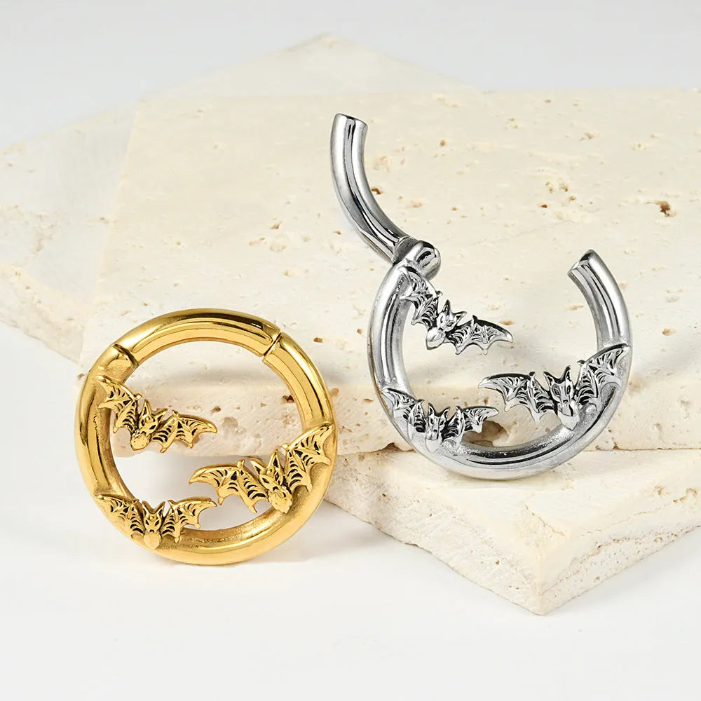 Stainless steel totem pattern earrings in electroplated finishes, showing one of fifteen style variations.