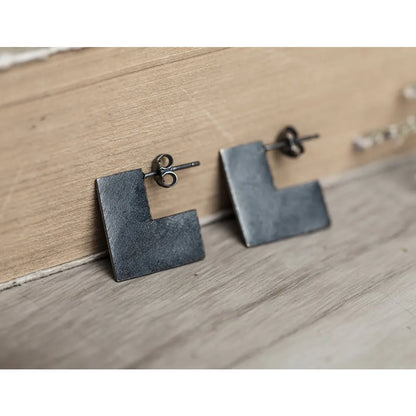 Square geometric silver earrings with oxidation black finish, 16mm diameter minimalist design