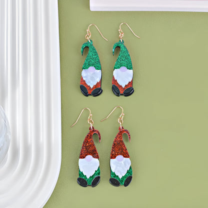 Acrylic Santa Claus cartoon character earrings in red, green, and red/green hat styles.