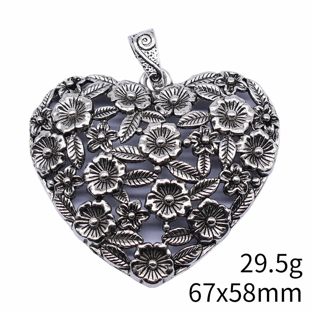 Hollow floral love pendant in ancient silver finish with European American styling