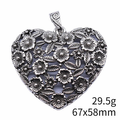 Hollow floral love pendant in ancient silver finish with European American styling