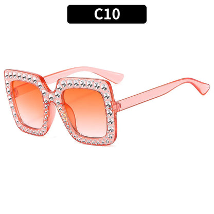 Plastic sunglasses with fashion personality styling in various colour options including black frame and transparent tea frame