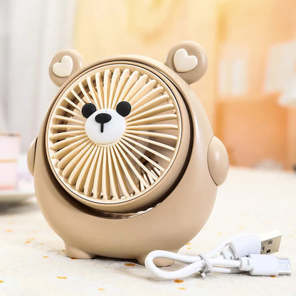 USB desktop fan with cute dog design in Bear Brown colour, showing compact size and three speed buttons.