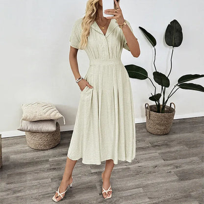 Light green women's shirt dress with lapel collar, waist tie fastening, and side pockets