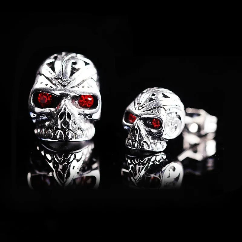 Retro red eye ghost head skull stud earrings with electroplated alloy construction and artificial gemstone inlay