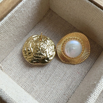 Round gold electroplated retro earrings for women with circular design elements