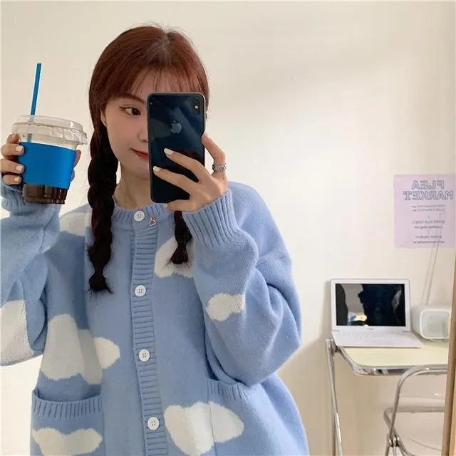 Blue cloud pattern women's spandex cardigan sweater with long sleeves and loose fit.