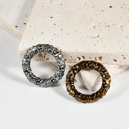 Stainless steel totem pattern earrings in electroplated finishes, showing one of fifteen style variations.