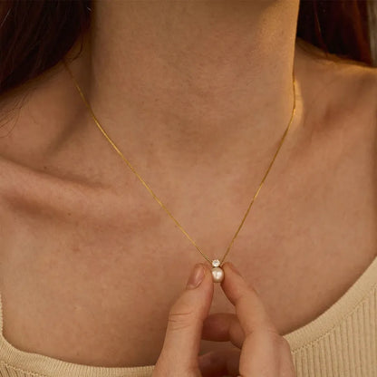 Women's stainless steel necklace with pearl zircon pendant in gold or steel colour options