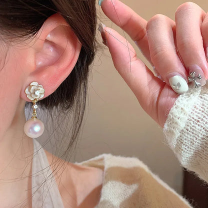 Camellia flower stud earrings for women in alloy with floral design