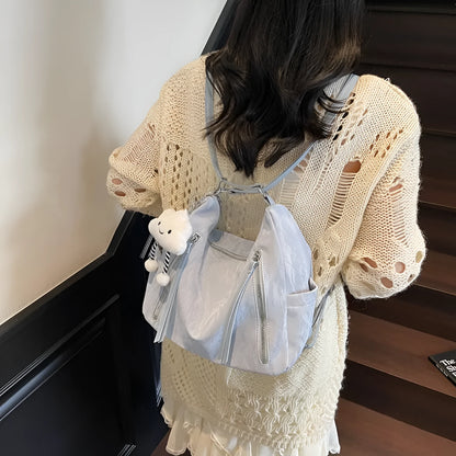 Women's soft PU backpack shoulder bag with pendant accessory in multiple colour options