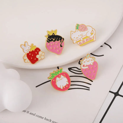 Alloy cat brooch with strawberry cake and dripping oil design in enamel colours