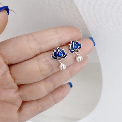 Blue lotus earrings with retro artistic seedpod tassel design, 1.2cm wide alloy studs