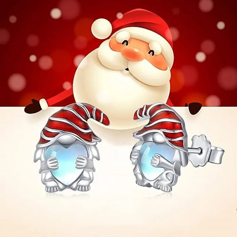 Santa Claus heart-shaped earrings in white gold colour on copper background
