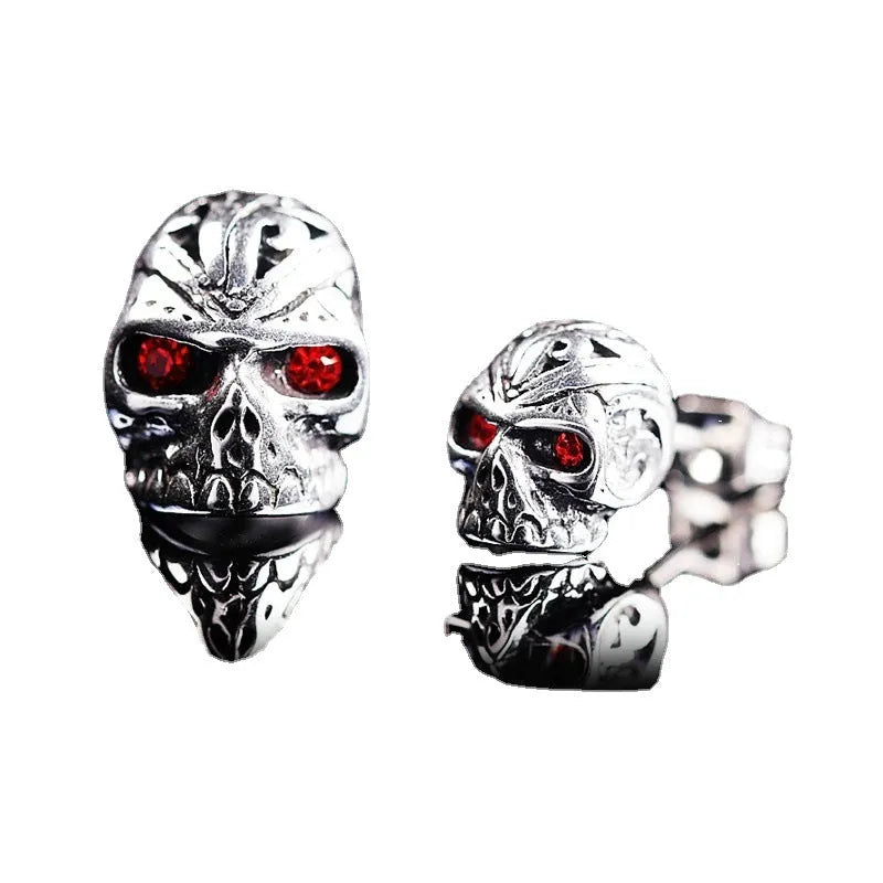 Retro red eye ghost head skull stud earrings with electroplated alloy construction and artificial gemstone inlay