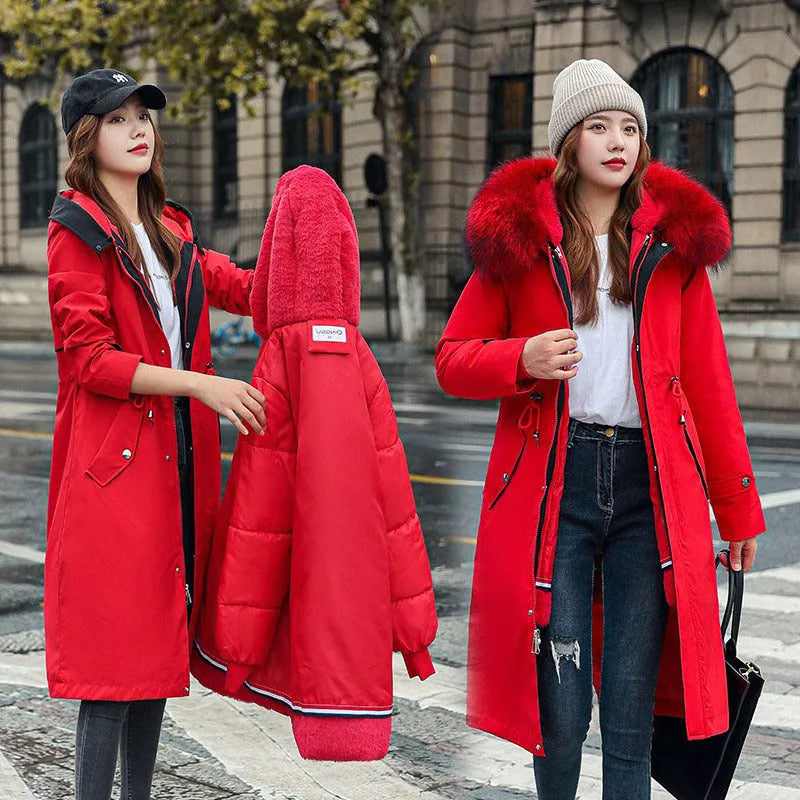 Women's long padded beige trench coat with a fleece lining, shown on a model.
