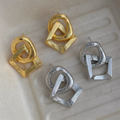 Copper geometry circle pendant earrings with electroplated gold finish measuring 3.4cm in height