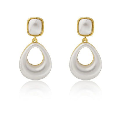 Gold drop earrings with imitation mabe pearl component and 14K gold plating