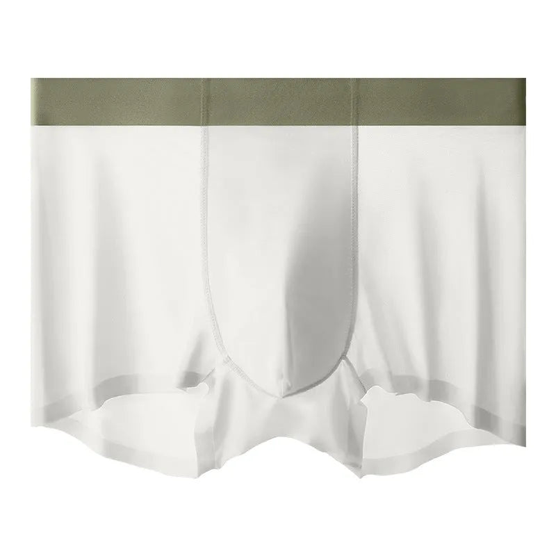 Man wearing bean green ice silk shorts with seamless design and mid-waist fit.