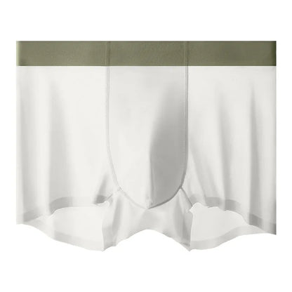 Man wearing bean green ice silk shorts with seamless design and mid-waist fit.
