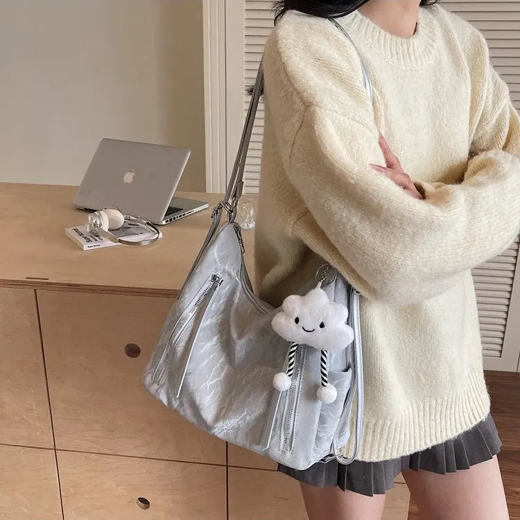 Women's soft PU backpack shoulder bag with pendant accessory in multiple colour options