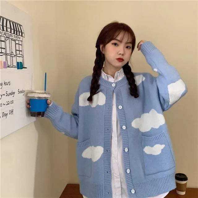 Blue cloud pattern women's spandex cardigan sweater with long sleeves and loose fit.