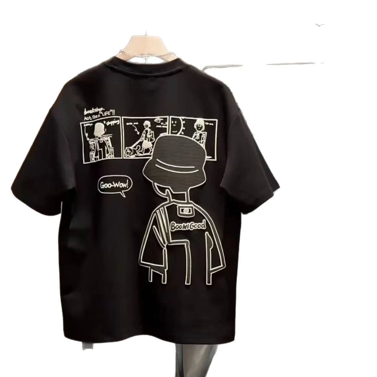 Men's black cotton short sleeve T-shirt featuring a cartoon print design on the front.