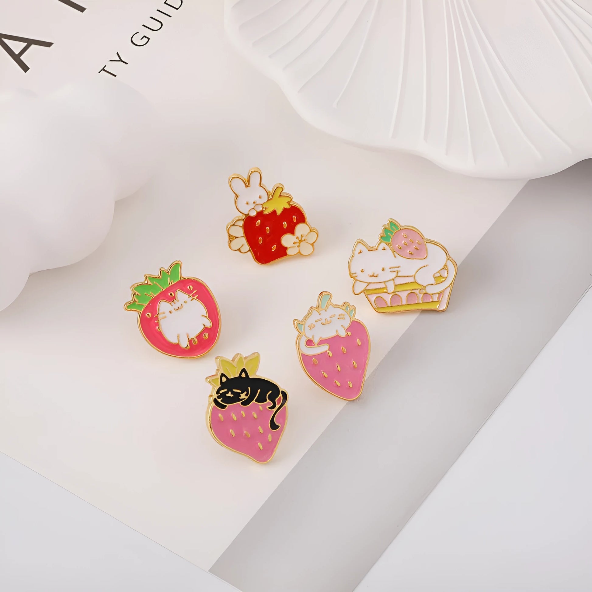 Alloy cat brooch with strawberry cake and dripping oil design in enamel colours