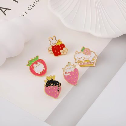 Alloy cat brooch with strawberry cake and dripping oil design in enamel colours