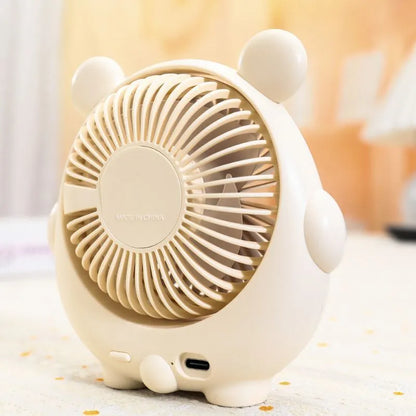 USB desktop fan with cute dog design in Bear Brown colour, showing compact size and three speed buttons.