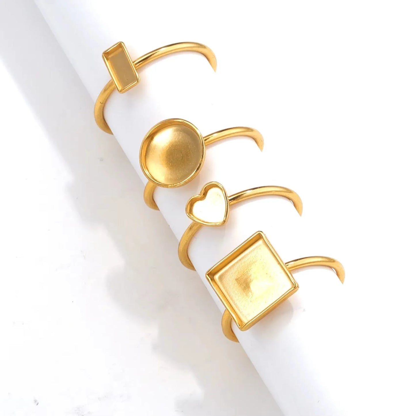 Golden electroplated stainless steel ring setting with totem pattern on ring holder