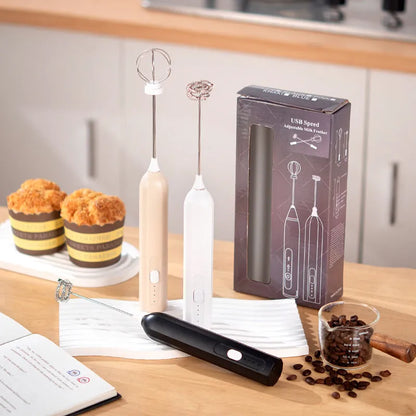 Handheld USB rechargeable electric whisk in apricot colour with mixing attachment