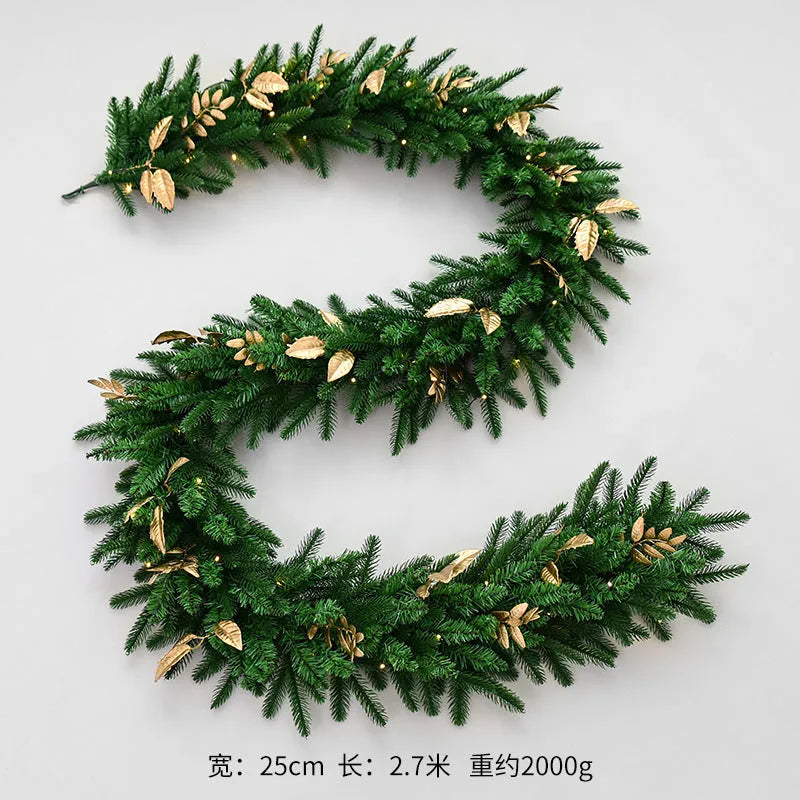 Long 2.7 metre Christmas PE rattan garland with velvet balls and integrated lights in golden leaf or red rattan colour.