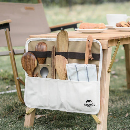 Durable, organised portable picnic tableware storage bag with multiple compartments for utensils