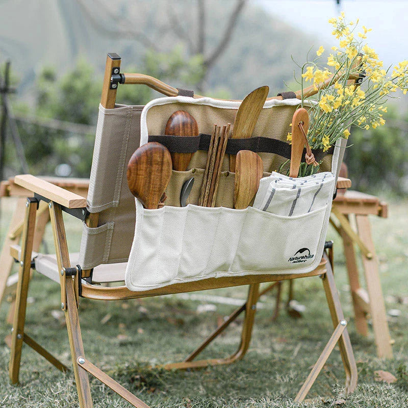 Durable, organised portable picnic tableware storage bag with multiple compartments for utensils